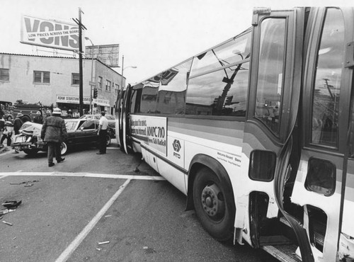 Car and bus collide