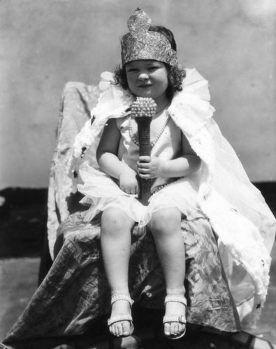 Young girl wearing crown