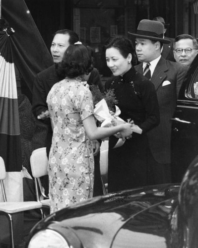 Madame Chiang Kai-Shek given flowers