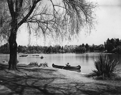 Canoers enjoy the lake at MacArthur Park