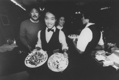 Waiters in Chinese restaurant