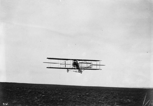 Biplane in low flight