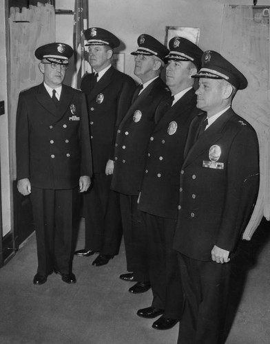 Chief Parker and his officers wear new uniforms