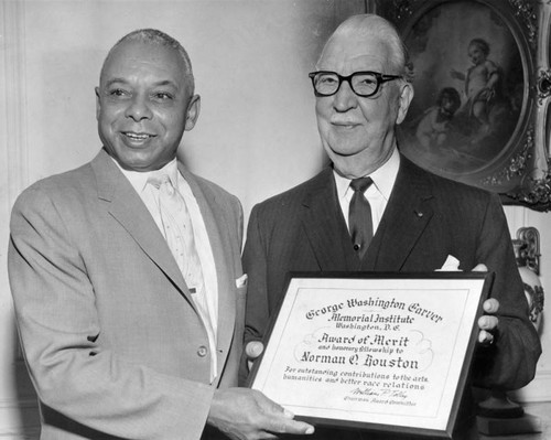 Norman Houston receives award