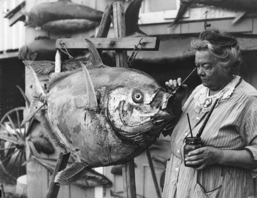 Woman preserves fish