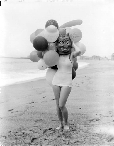 Woman in a masque at Venice Beach