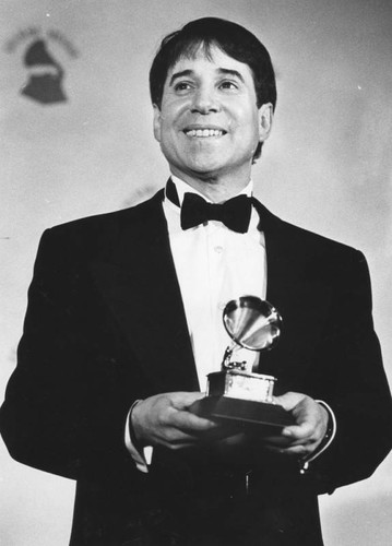 Paul Simon wins for "Graceland"