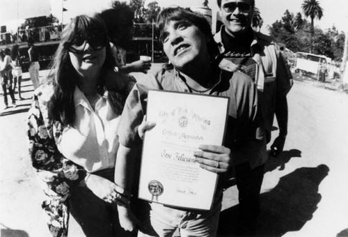 Jose Feliciano with certificate