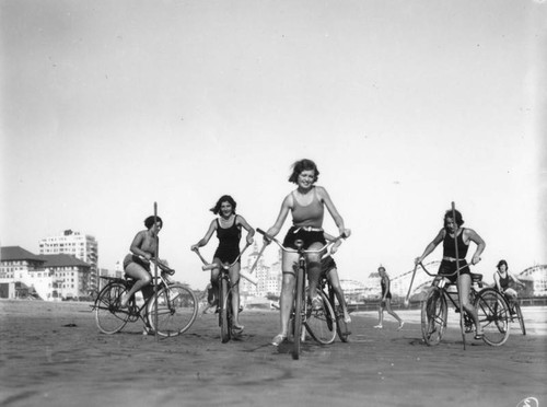 Beach beauties on bicycles, view 1