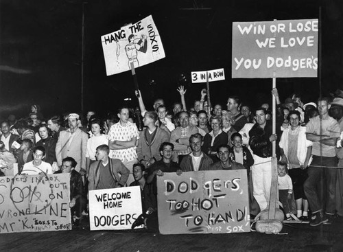 Hang the Sox!' is victory cry of rooters welcoming Dodgers home