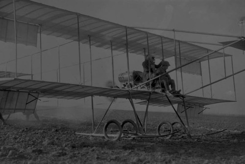 Mr. and Mrs. Paulhan in Farman biplane