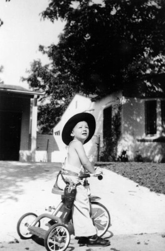 Boy on his tricycle