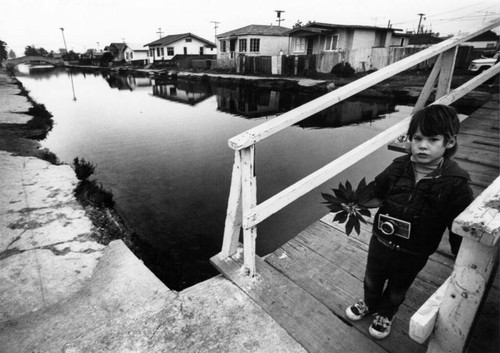 Child on bridge at Sherman Canal