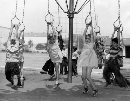 Hanging on rings at the playground