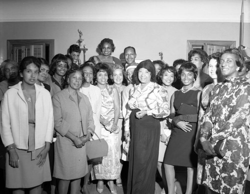 Councilmember Tom Bradley with a group of unidentified women