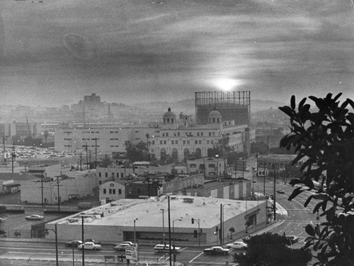 Sunrise over a smoggy downtown Los Angeles