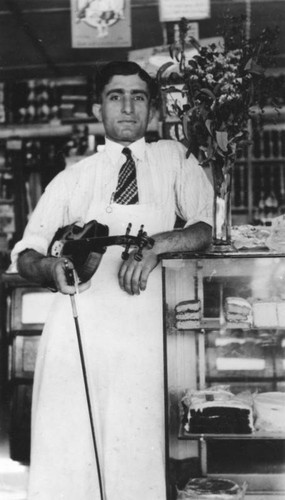 Armenian American grocer with violin