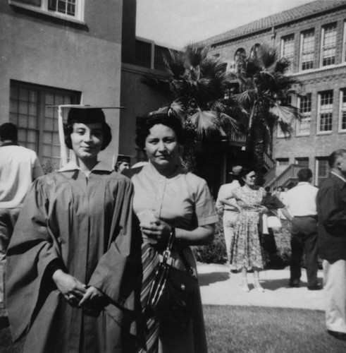 Mexican American high school graduate and her mother