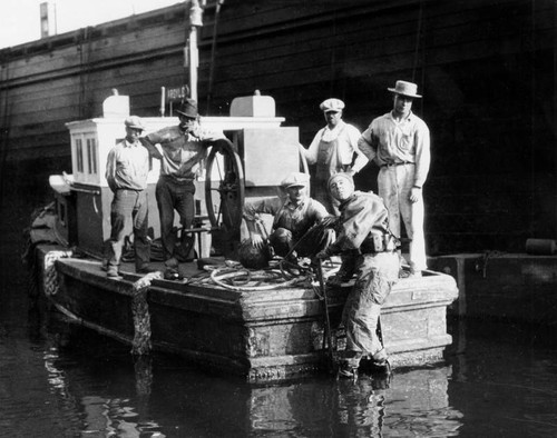 Boat crew and diver