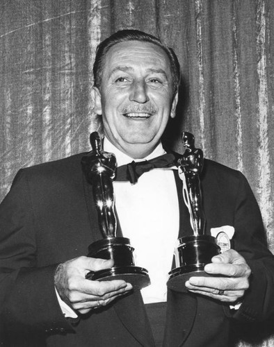 Walt Disney with Oscars