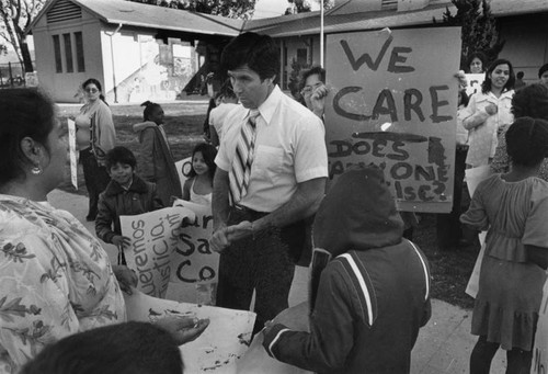 School Principal speaks with protesters