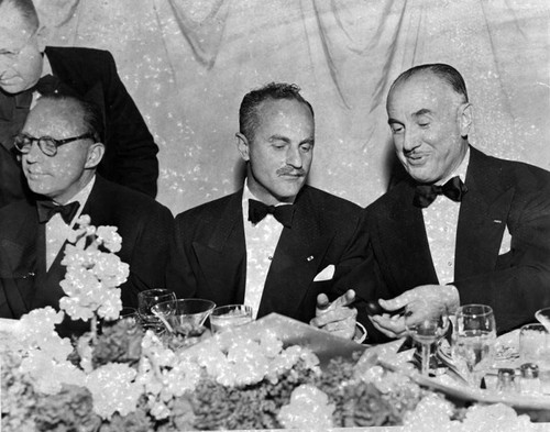 Benny, Zanuck & Warner at banquet