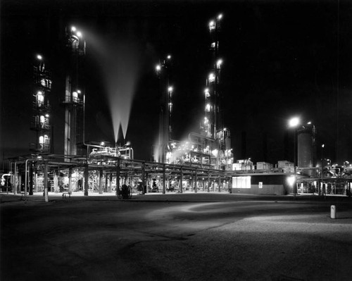 View of oil refinery at night