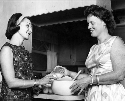 Mmes. Donnelly and Michaud make ice cream