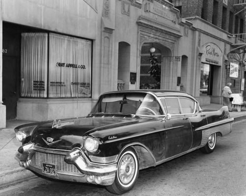 Cadillac automobile in front of Haddon Hall apartments