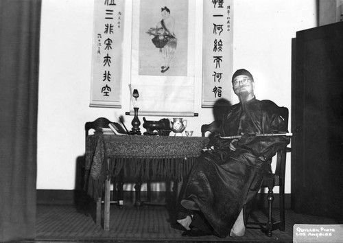 Chinese man seated