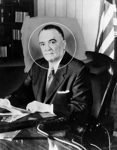 J. Edgar Hoover at his desk