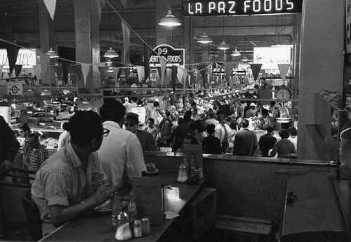 Snack stand customers at Grand Central Market