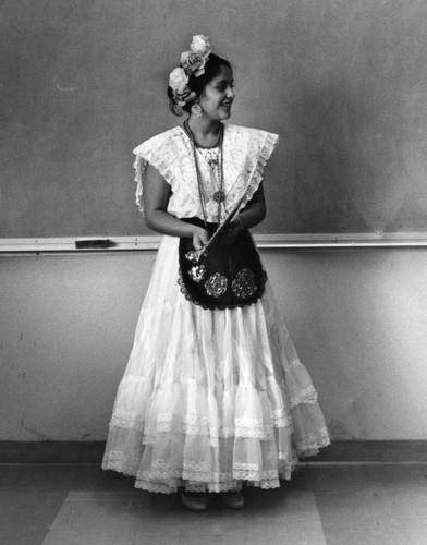 Girl dressed as Mexican folk dancer