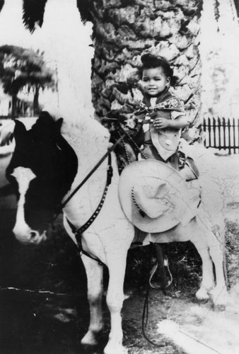 Child on pony