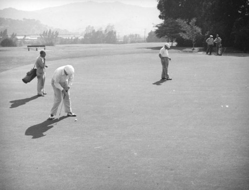 On the green at the Lakeside golf course