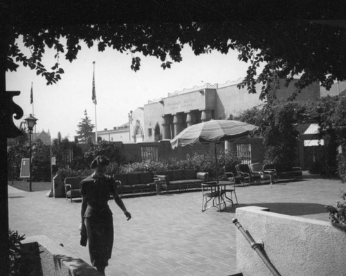 Woman walking by the Ambassador Hotel