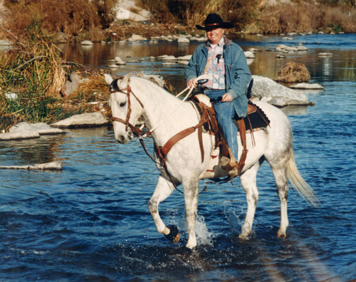 Larry Perkins crossing the L.A. River on horse