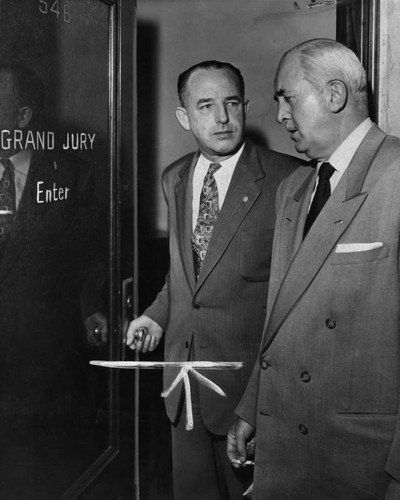 William H. Parker and S. Ernest Roll enter grand jury room