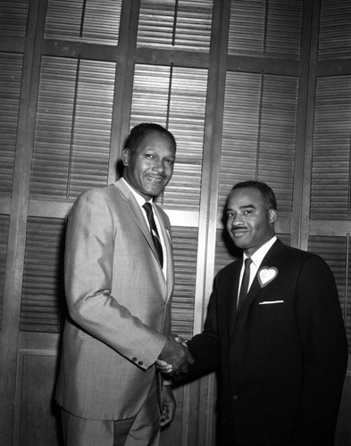 Councilmember Tom Bradley with unidentified man