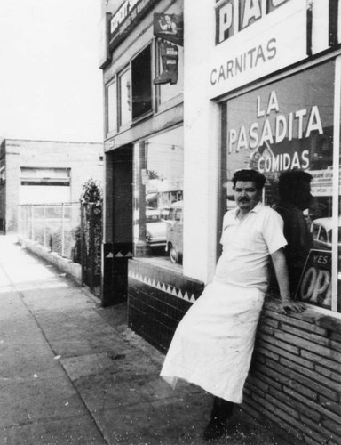 Man in front of restaurant