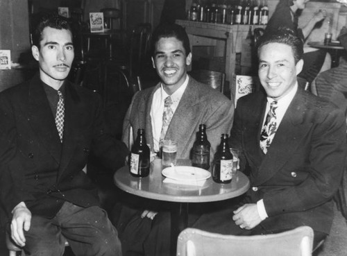 Three men in a bar