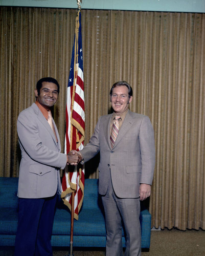 Billy Mills with unidentified man at Los Angeles City Hall