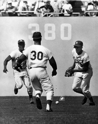 Hapless Willie watches Etchebarren's fly ball fall to the ground