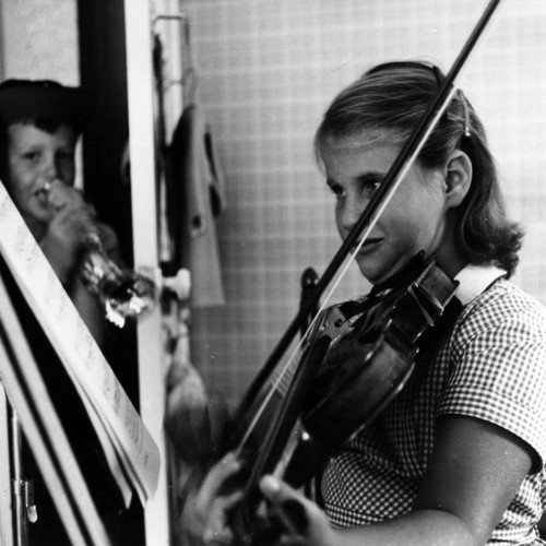 Girl practicing the violin