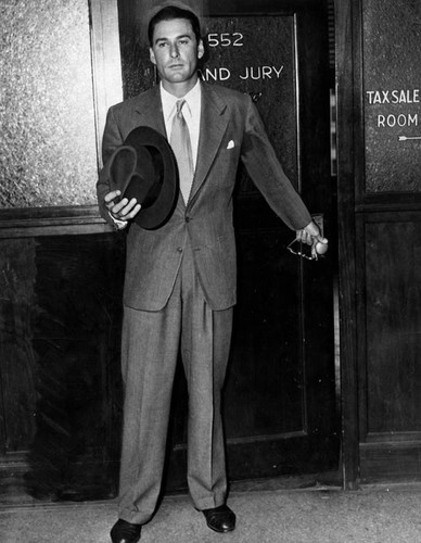 Errol Flynn exiting Grand Jury room