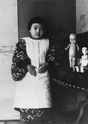 Japanese girl with dolls