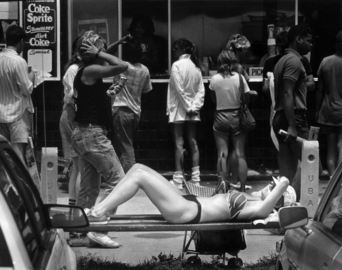 Catching rays on the Venice Boardwalk