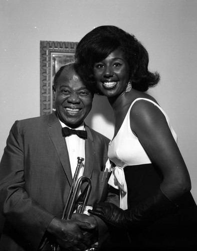 Louis Armstrong is presented with a resolution