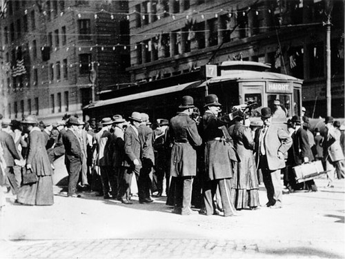 [Crowd of people near streetcar at Market and Kearney streets]