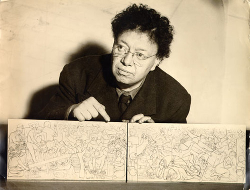 [Artist Diego Rivera holding plans for a mural to be painted as part of the Art in Action exhibit of the 1940 Golden Gate International Exposition]